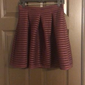 Pleated maroon skirt